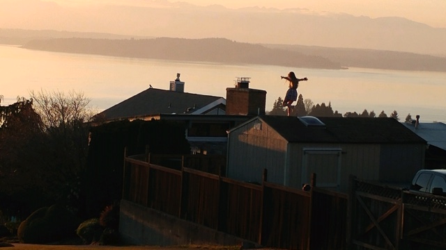 WestSeattleDancerRooftopCarona